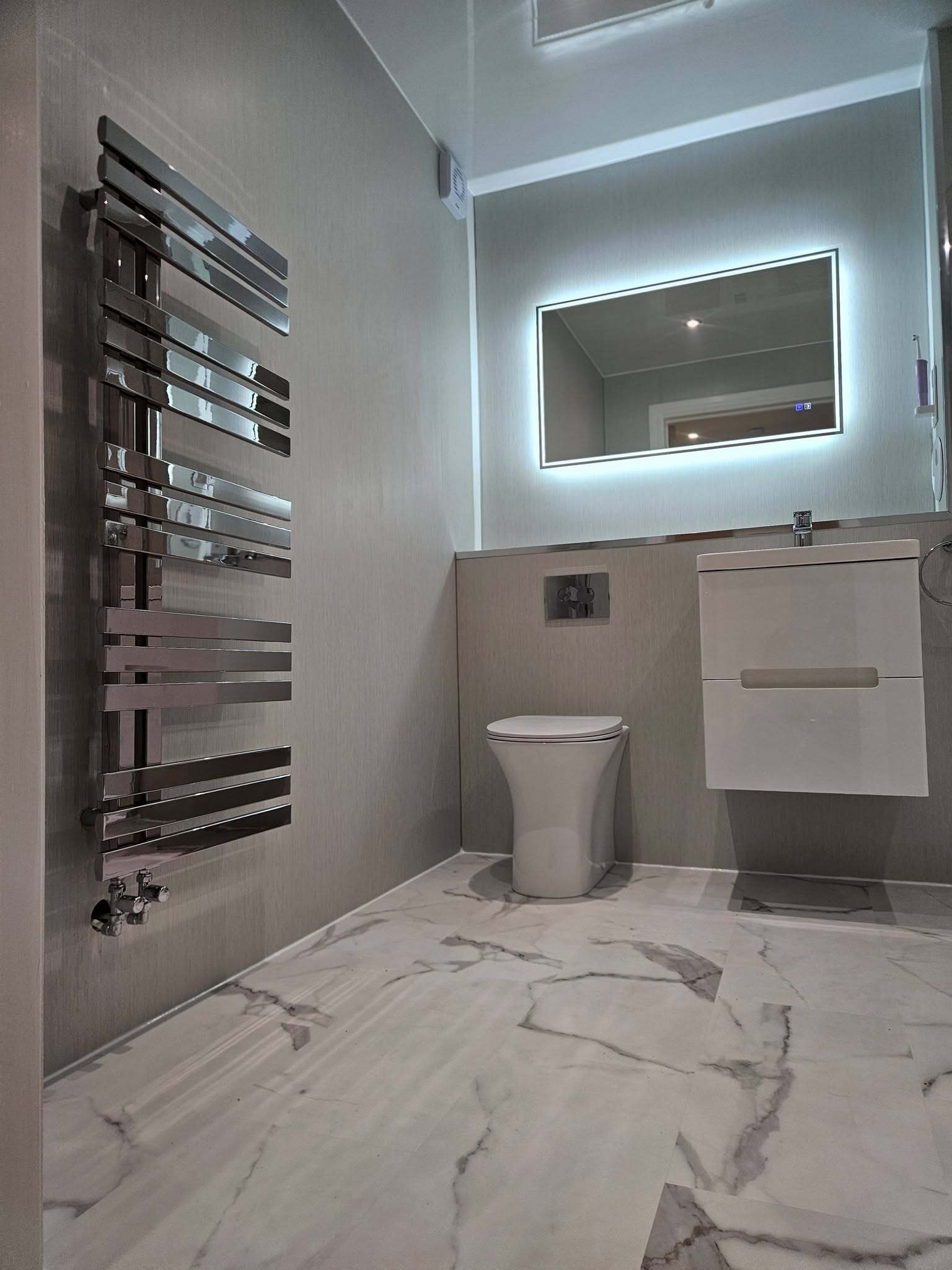 Modern bathroom renovation with freestanding bath and walk-in shower