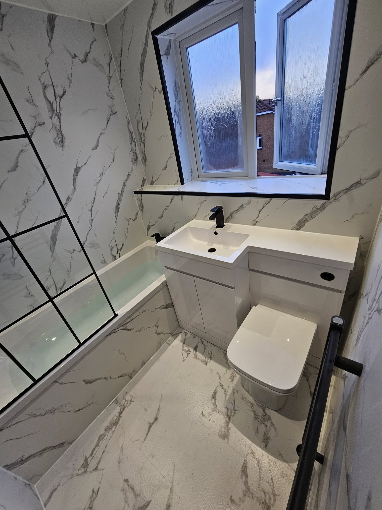 Green tiled walk-in shower bathroom