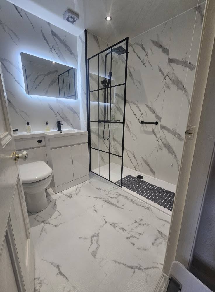 Marble wet room with glass screen